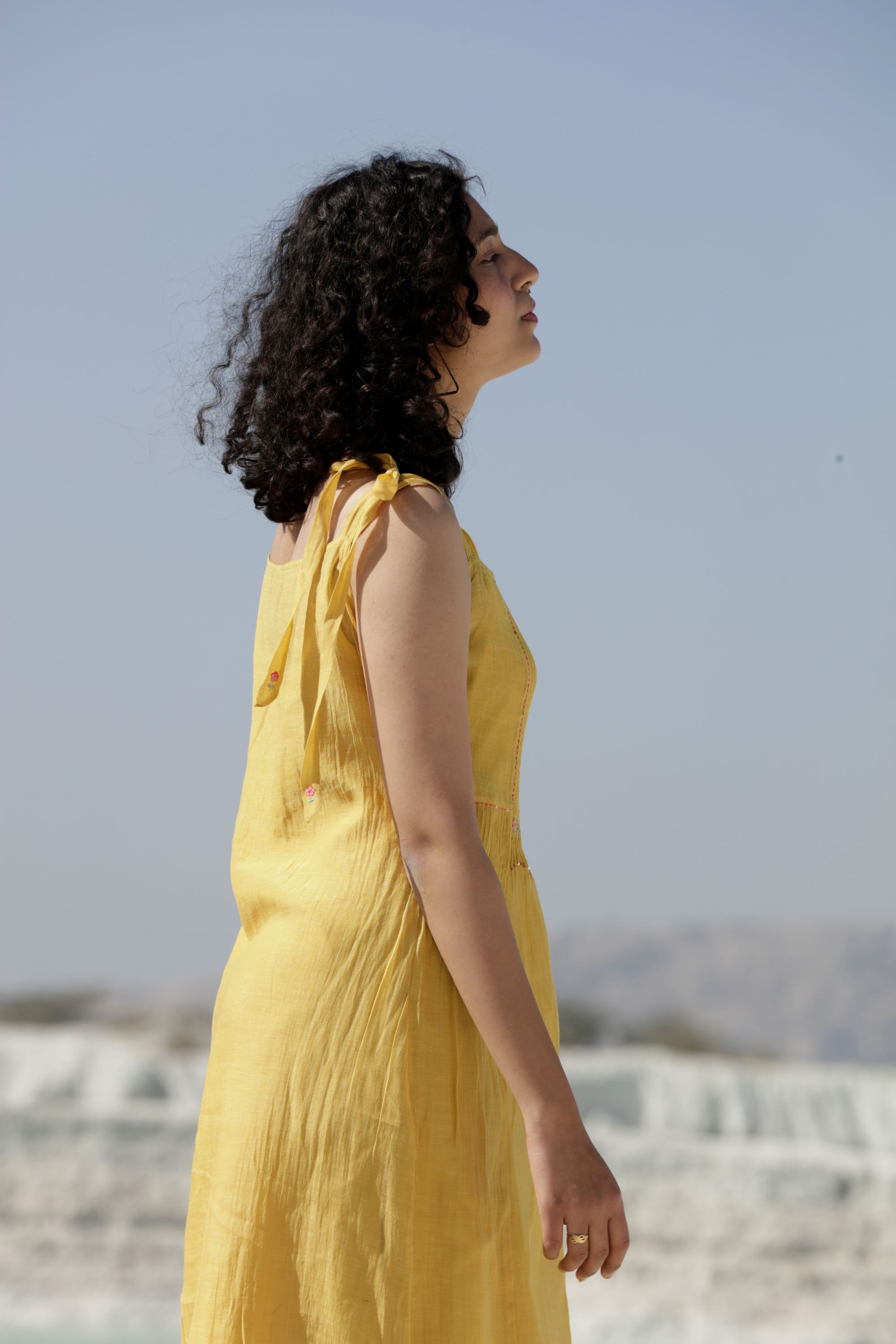 Mustard yellow
shoulder tie dress
